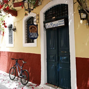 Colourful alleyway and entrance to Taverna Larenzo, Rethymnon Old Town, Crete, Greece