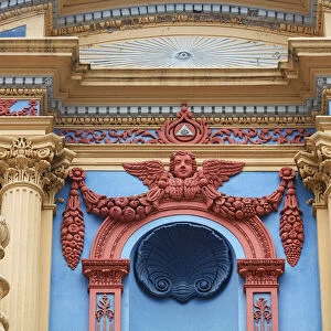 A colourful detail on the main facade of the "Nuestra Senora de la Candelaria de la Vina" church, Salta, Argentina. The church has a mixed architectural style: Baroque and Italianate