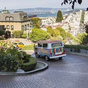 A colourful minibus descends Lombard Street. San Francisco, Marin County, California, USA