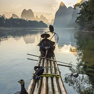 Cormorant fisherman on Li River, Guangxi Zhuangzu Zizhiqu, Guangxi<br>Yangshuo