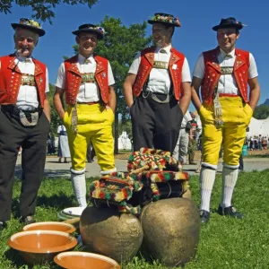 Cowbell ringers in Traditional Alpine Costume at the