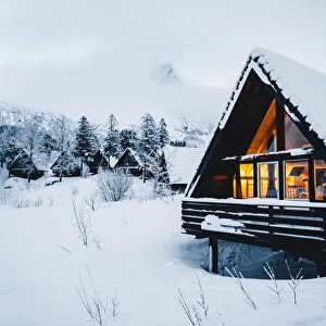 Cozy house covered with fresh snow in Svolvaer. Lofoten Islands, Nordland, Norway