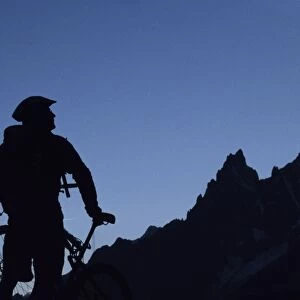 A cyclist on a mountain bike tour of Mont Blanc
