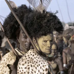 A Dassanech man in full tribal regalia participates