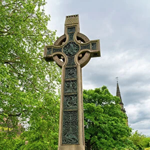 Dean Ramsay Memorial Cross, with tower of the parish church of St. Cuthbert in background, Edinburgh, Lothian, Scotland, UK