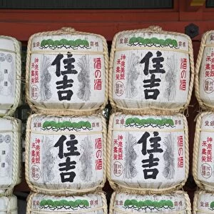 Decorative sake barrels at Shinto shrine of Sumiyoshi Taisha, Osaka, Kansai, Japan