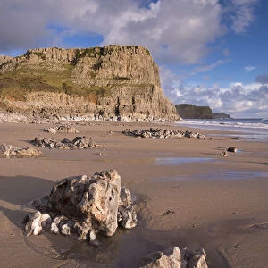 Dramatic cliffs and sandy beaches at Fall Bay on the Gower Peninsula, Wales, UK. Winter