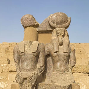 Egypt, Luxor, West Bank, The temple of Ramesses 111 at Medinet Habu, Two statues in