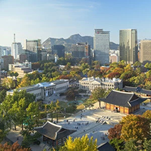 Elevated view of Deoksugung Palace and skyscrapers, Seoul, South Korea