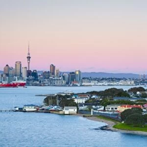 Elevated View Over Devenport towards Central Business District illuminated at dawn, Auckland, New Zealand
