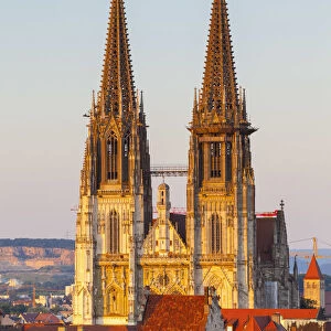 Elevated view towards St. Peters Cathedral illuminated at sunset, Regensburg