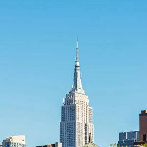 Empire state building from the High line park, New York, USA