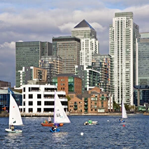 England, London, Docklands, Sailing in Millwall docks infront of Canary Wharf