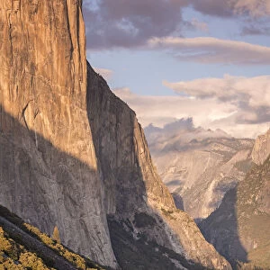 The enormous face of El Capitan towering above Yosemite Valley, California, USA. Autumn