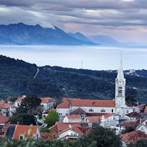 Europe, Croatia, Dalmatia, Brac, Selca town with the Dinaric Alps behind