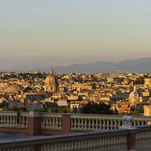 europe, Italy, Latium. Rome, the city at sunset seen from a terrace above Trastevere near