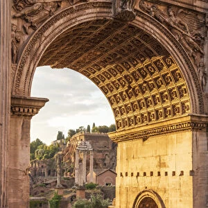 Europe, Italy, Rome. The arch of Septimus Severus in the Forum Romanum at sunrise