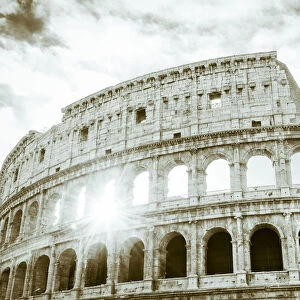 Europe, Italy, Rome. The Colosseum with morning sun, black and white
