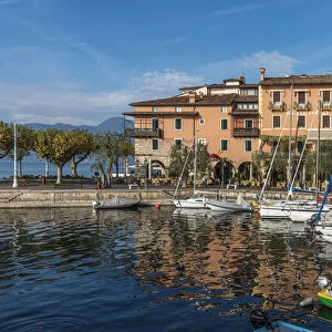 europe, Italy, Veneto. a sunny afternoon at Garda Lake town Torri del Benaco