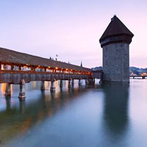 Europe, Switzerland, Lucerne. Bridge at dusk