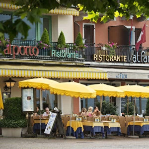 Europe, Switzerland, Ticino, Ascona, outdoor restaurants along the waterfront