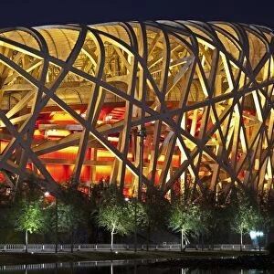 Exterior of the Olympic Stadium, Datun, Beijing, China by night
