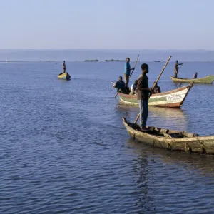 Fishermen return to Dunga Beach soon after sunrise