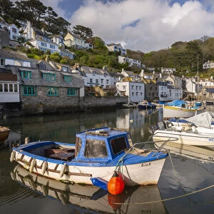 Fishing boat moored in Polperro Harbour on a sunny Spring morning, Cornwall, England