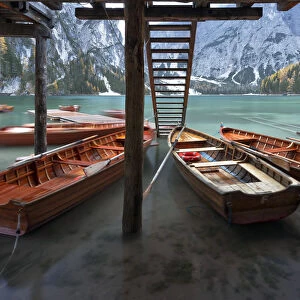 The floating dock and boats at Braies Lake, Natural Park fanes-sennes-braies, Bolzano