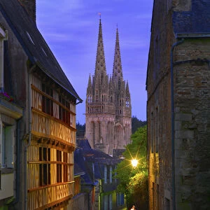 France, Brittany, Finistere, Quimper, view down cobbled street to Saint Corentin