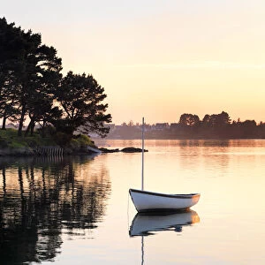 France, Brittany, Morbihan, Belz, Etel river, St. Cado, boat at sunset