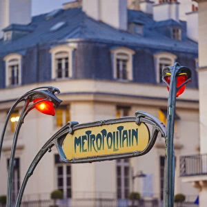 France, Paris, metro sign at dusk