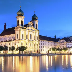 Franz Xaver Jesuit Church and Reuss River at dusk, Lucerne, Switzerland Franz Xaver Jesuit Church and Reuss River at dusk, Lucerne, Switzerland