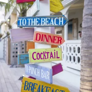 French West Indies, St-Martin, Grand Case, Gourmet Capital of the Caribbean, streetsigns French West Indies, St-Martin, Grand Case, Gourmet Capital of the Caribbean, streetsigns