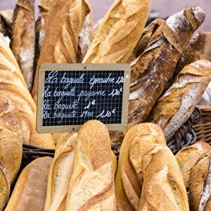Fresh bread sold at the local market in Colmar, Alsatian Wine Route, France