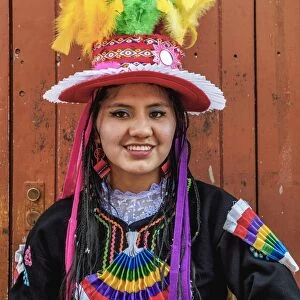 Girl in traditional clothing, Fiesta de la Virgen de la Candelaria, Puno, Peru