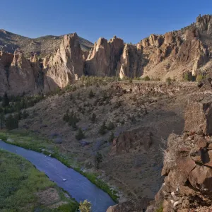 Two girls resting on cliff face, Smith Rock State Park, Central Oregon, USA MR