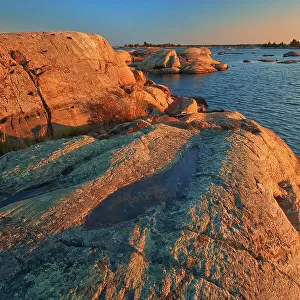 Glacially eroded Precambrian shield rock on coast islands in Georgian Bay (Lake Huron) French River Provincial Park, Ontario, Canada