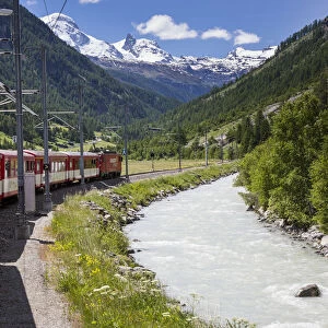 Glacier Express train climbing towards Zermatt, Valais, Switzerland