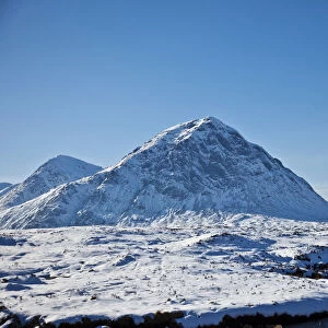 Glen Coe, Scotland. Snow covers the picturesque Glen Coe, with Buachaille Etive Mor