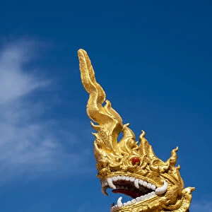 Golden dragon statue at Dhart Zom Doi Kabar Aye Pagoda near Kengtung, Mong La