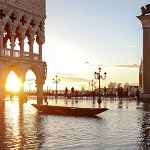 Gondola during High Water (Acqua alta) in St Marks square, Piazzetta, Venice, Veneto