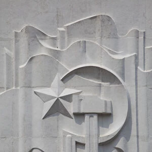 Hammer and Sickle emblem on the Ho Chi Minh Museum, Hanoi, Vietnam