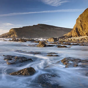 High tide floods the rocky ledges of Duckpool beach on the North Cornish coast, Cornwall