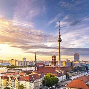 High view of Berlin Mitte district during sunset, with Fernsehturm tower