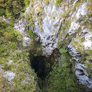 Highlining above Harwoods Hole, Golden Bay, New Zealand, Oceania