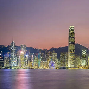 Hong Kong skyline, skyscrapers on Hong Kong Island seen from Tsim Sha Tsui at sunset