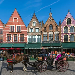 Horse carriage in Markt or Market Square, Bruges, West Flanders, Belgium