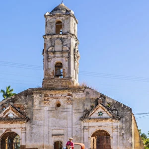 Horse-drawn carriage in front of Iglesia de Santa Ana in Trinidad, Sancti Spiritus, Cuba