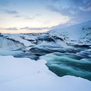 Iceland, Europe. Frozen Gullfoss waterfall in wintertime